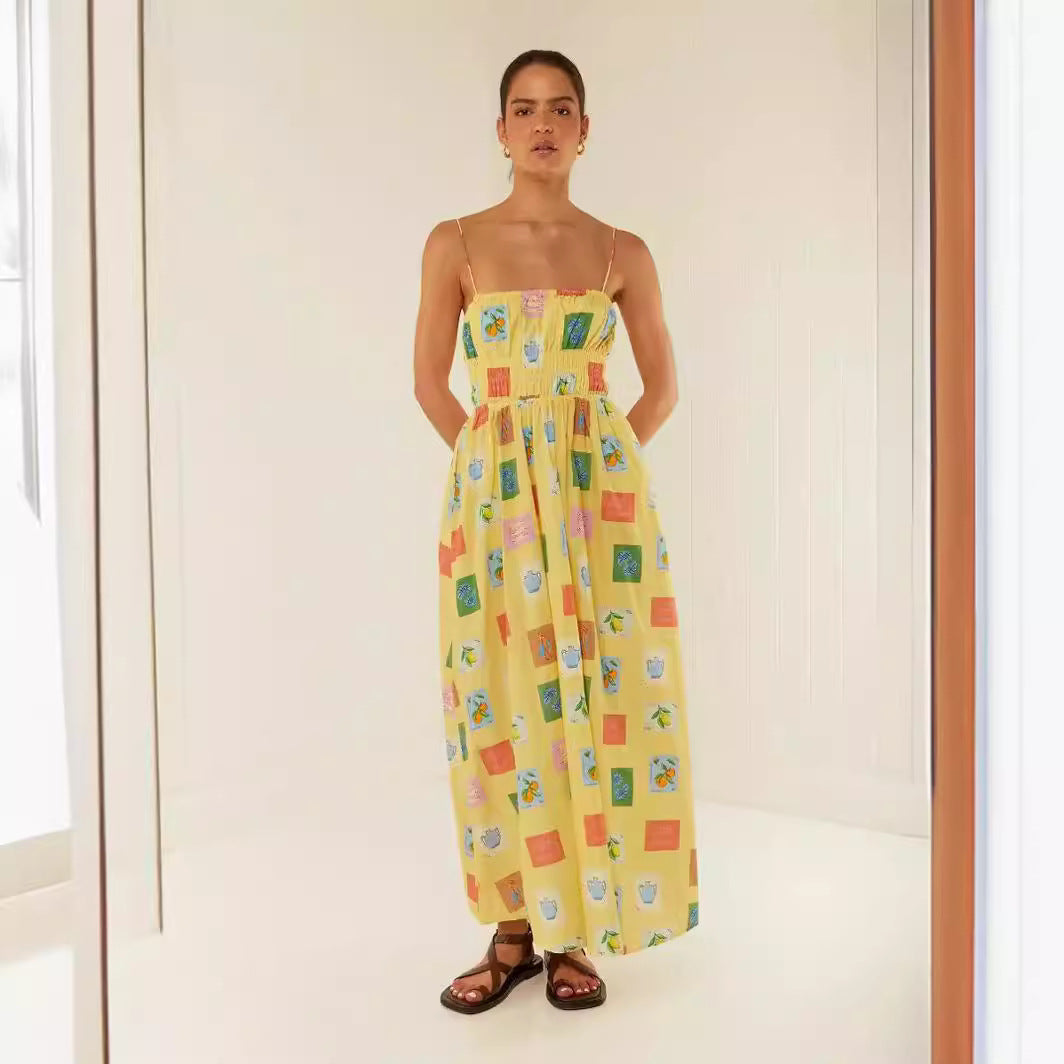 Kvinnors maxiklänning med elastisk midja och lekfullt blommönster Mirla-Eva Jonsson