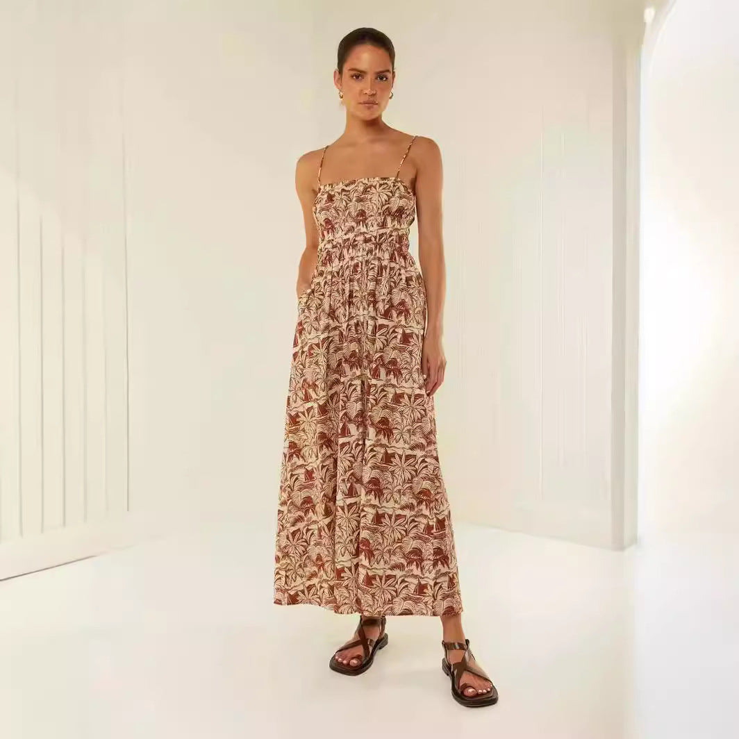 Kvinnors maxiklänning med elastisk midja och lekfullt blommönster Mirla-Eva Jonsson