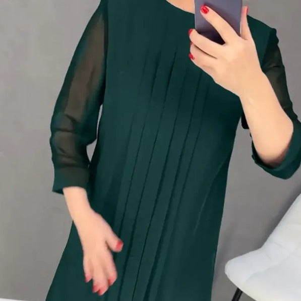 Kvinnors maxiklänning med elegant drapering och transparenta ärmar Mirla-Eva Jonsson