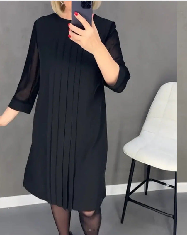 Kvinnors maxiklänning med elegant drapering och transparenta ärmar Mirla-Eva Jonsson