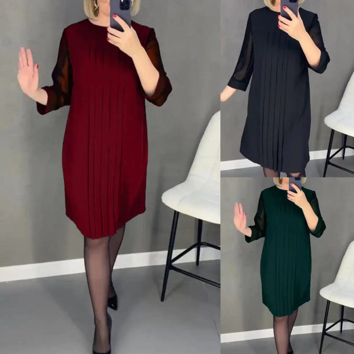 Kvinnors maxiklänning med elegant drapering och transparenta ärmar Mirla-Eva Jonsson