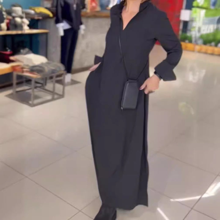 Kvinnors maxiklänning med elegant krage och praktisk fickdesign Mirla-Eva Jonsson