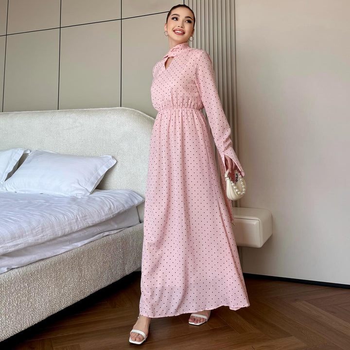 Kvinnors maxiklänning med eleganta prickar och stilig slits Mirla-Eva Jonsson
