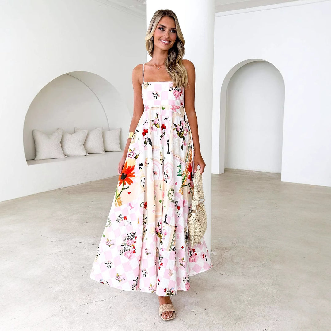 Kvinnors maxiklänning med eleganta remmar och blommiga detaljer Mirla-Eva Jonsson