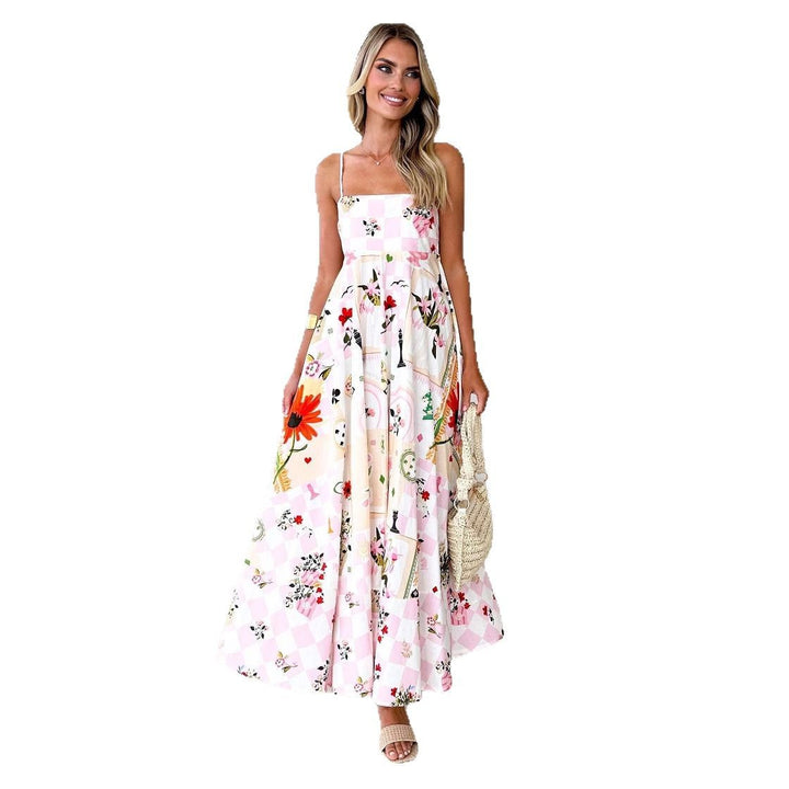 Kvinnors maxiklänning med eleganta remmar och blommiga detaljer Mirla-Eva Jonsson
