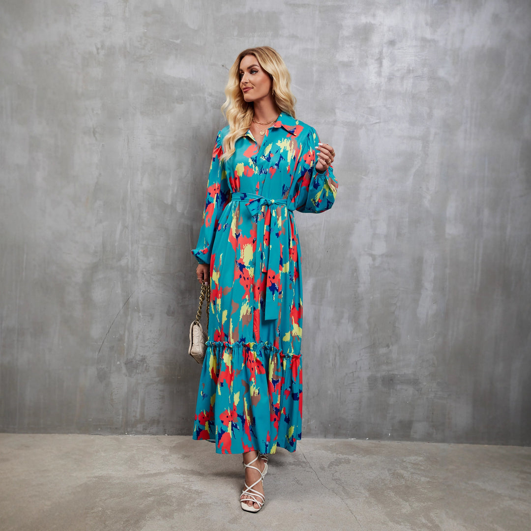 Kvinnors maxiklänning med färgglad blommig design och elegant midjebälte-Eva Jonsson