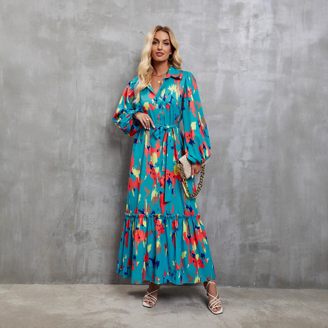 Kvinnors maxiklänning med färgglad blommig design och elegant midjebälte-Eva Jonsson