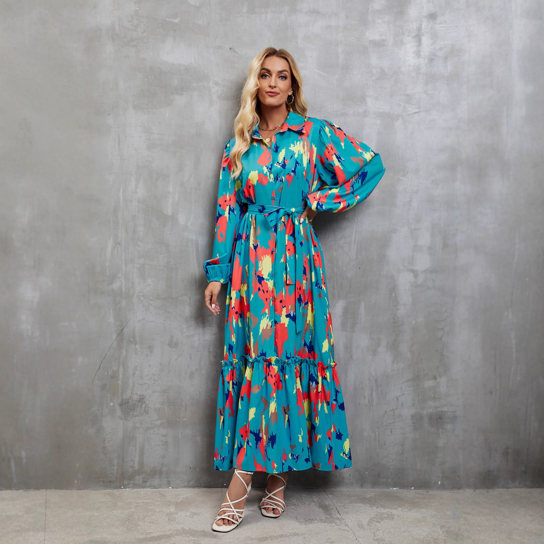 Kvinnors maxiklänning med färgglad blommig design och elegant midjebälte-Eva Jonsson