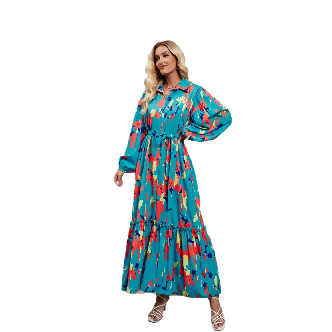 Kvinnors maxiklänning med färgglad blommig design och elegant midjebälte-Eva Jonsson