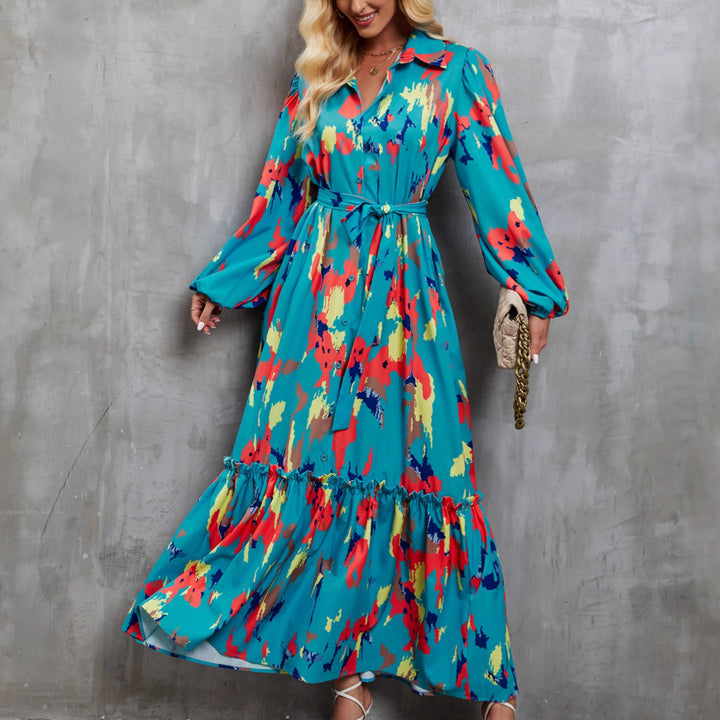 Kvinnors maxiklänning med färgglad blommig design och elegant midjebälte-Eva Jonsson