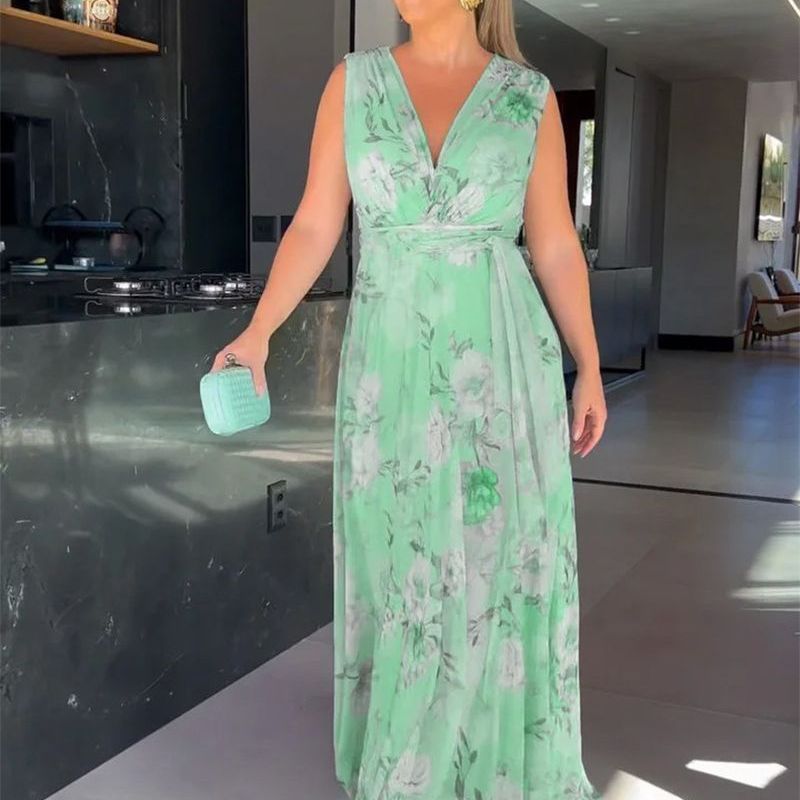 Kvinnors maxiklänning med flödande snitt och eleganta volangdetaljer-Eva Jonsson
