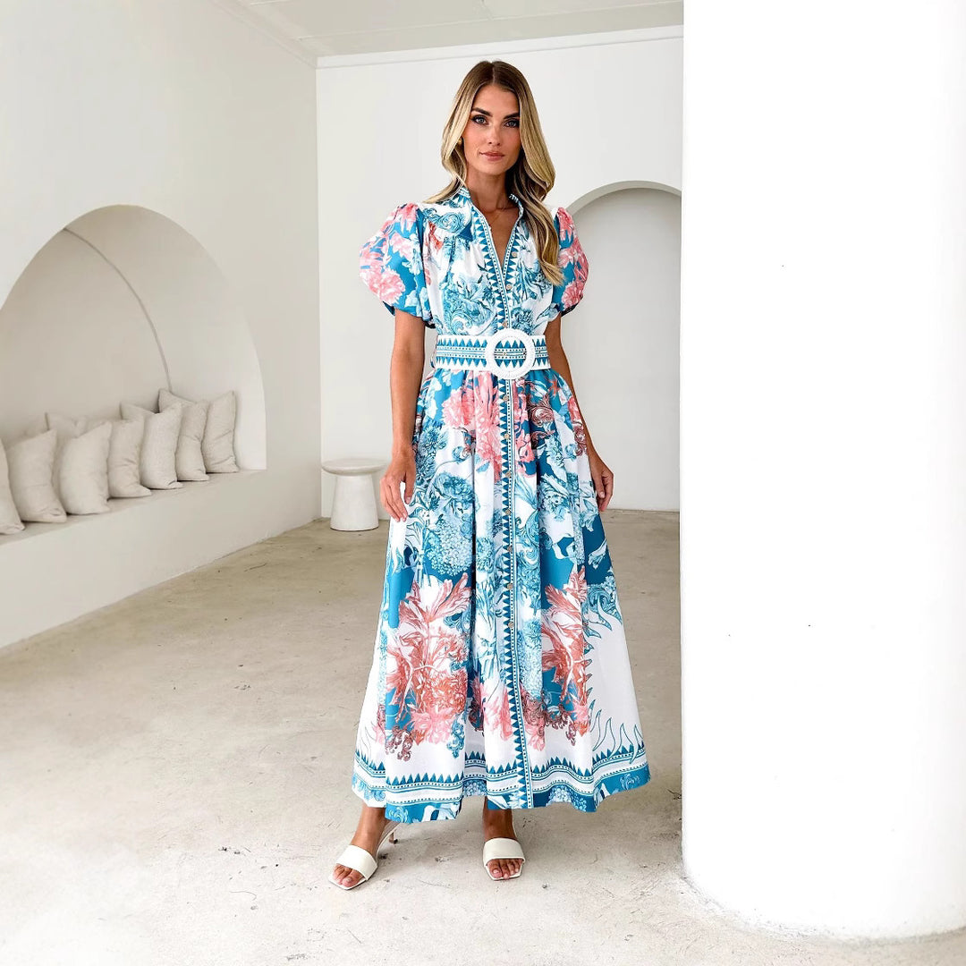 Kvinnors maxiklänning med hög krage och eleganta puffärmar Mirla-Eva Jonsson