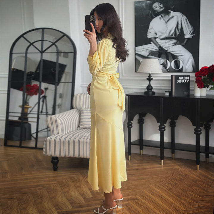 Kvinnors maxiklänning med knapplist och eleganta puffärmar-Eva Jonsson