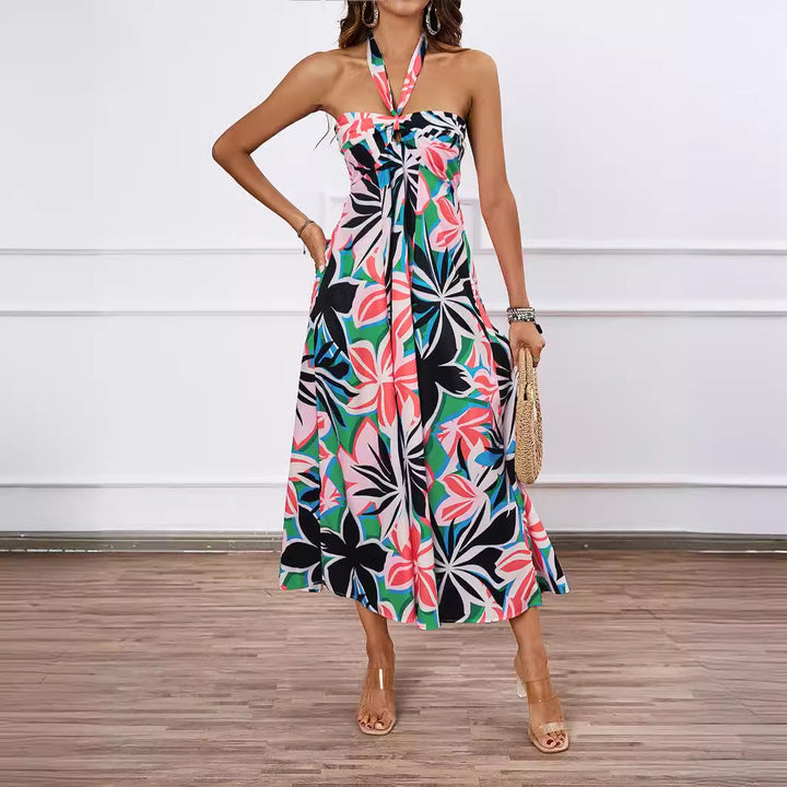 Kvinnors maxiklänning med off-shoulder design och blommönster Mirla-Eva Jonsson