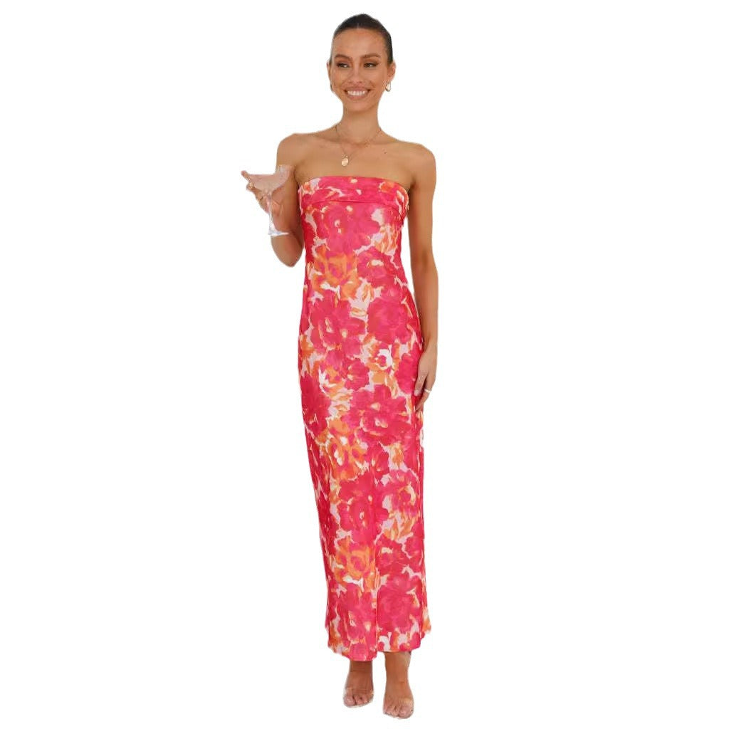 Kvinnors maxiklänning med off-shoulder design och blommönster Mirla-Eva Jonsson