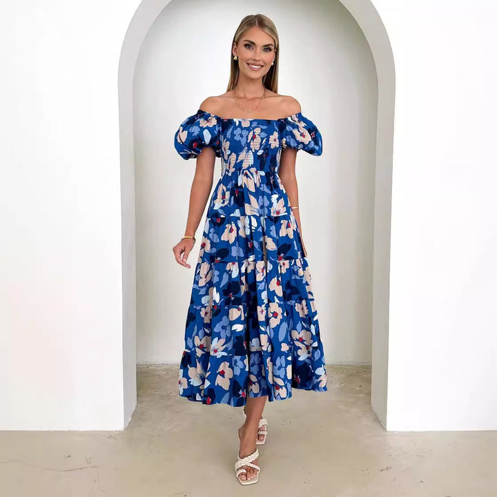 Kvinnors maxiklänning med puffärmar och blommig smugging-Eva Jonsson
