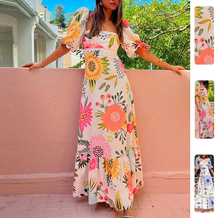 Kvinnors maxiklänning med puffärmar och blommönster detaljer Mirla-Eva Jonsson