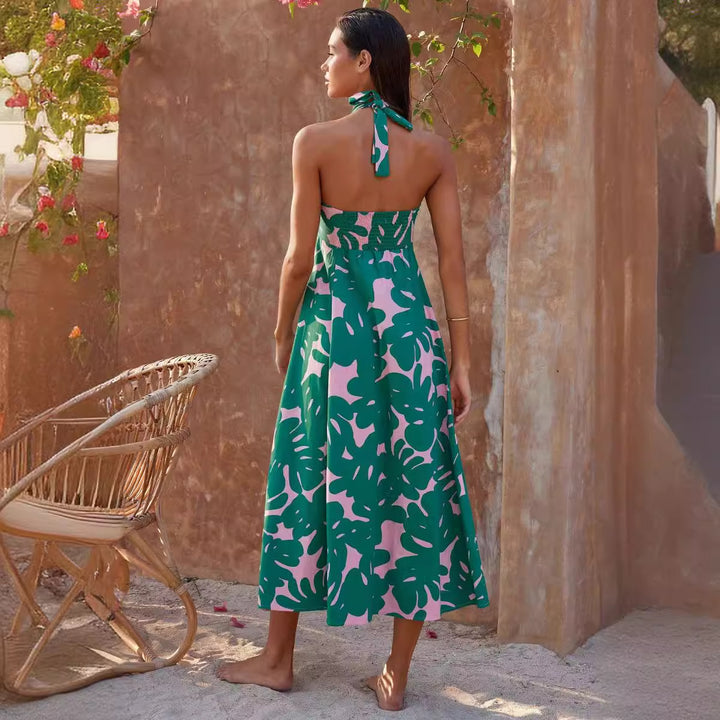Kvinnors maxiklänning med strapless helrörlig midja och blommönster Mirla-Eva Jonsson