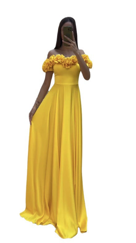 Kvinnors maxiklänning med volangdetaljer och avskuren axeldesign-Eva Jonsson