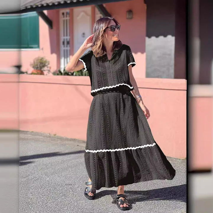 Kvinnors maxiklänning med voluminös kjol och elegant volang Mirla-Eva Jonsson