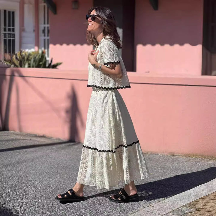 Kvinnors maxiklänning med voluminös kjol och elegant volang Mirla-Eva Jonsson