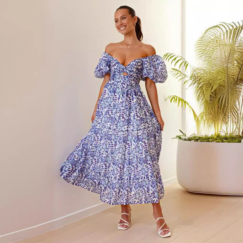 Kvinnors maxiklänning med voluminösa puffärmar och blommönster-Eva Jonsson