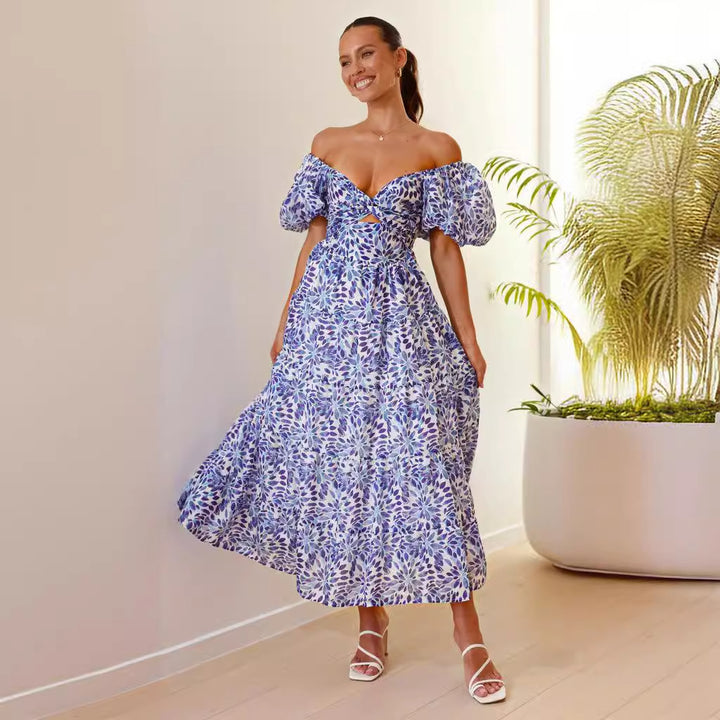 Kvinnors maxiklänning med voluminösa puffärmar och blommönster-Eva Jonsson