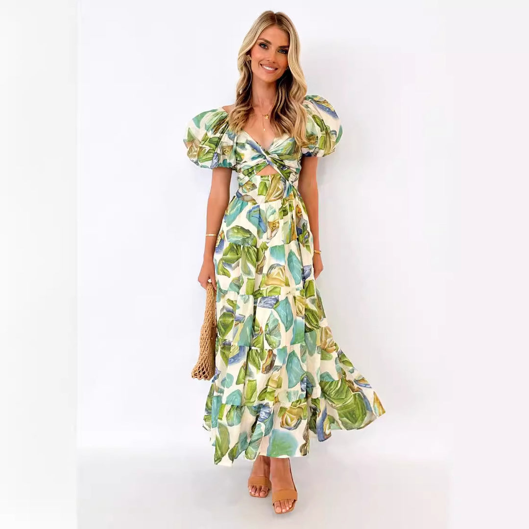 Kvinnors maxiklänning med voluminösa puffärmar och blommönster-Eva Jonsson