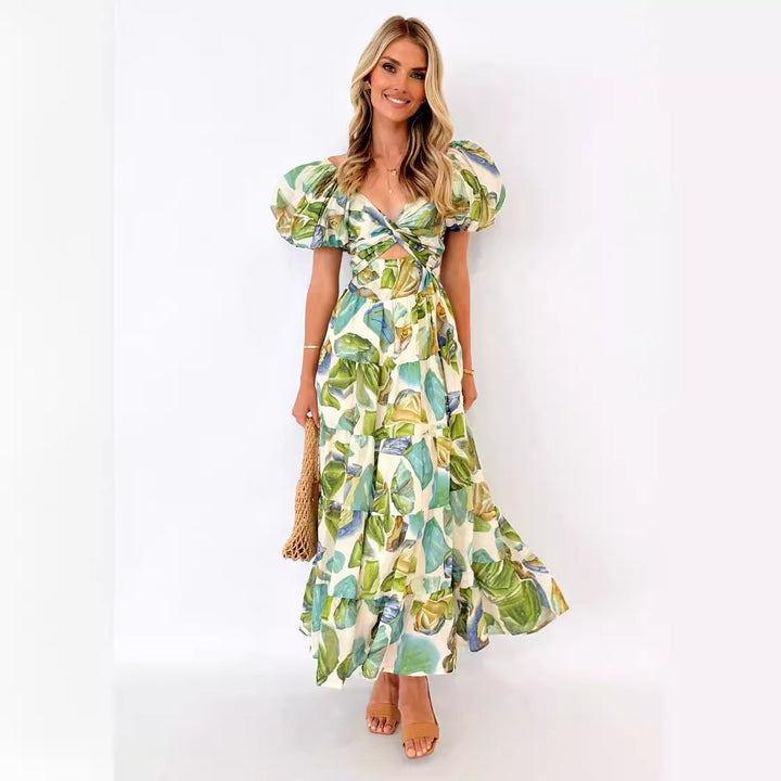 Kvinnors maxiklänning med voluminösa puffärmar och blommönster-Eva Jonsson