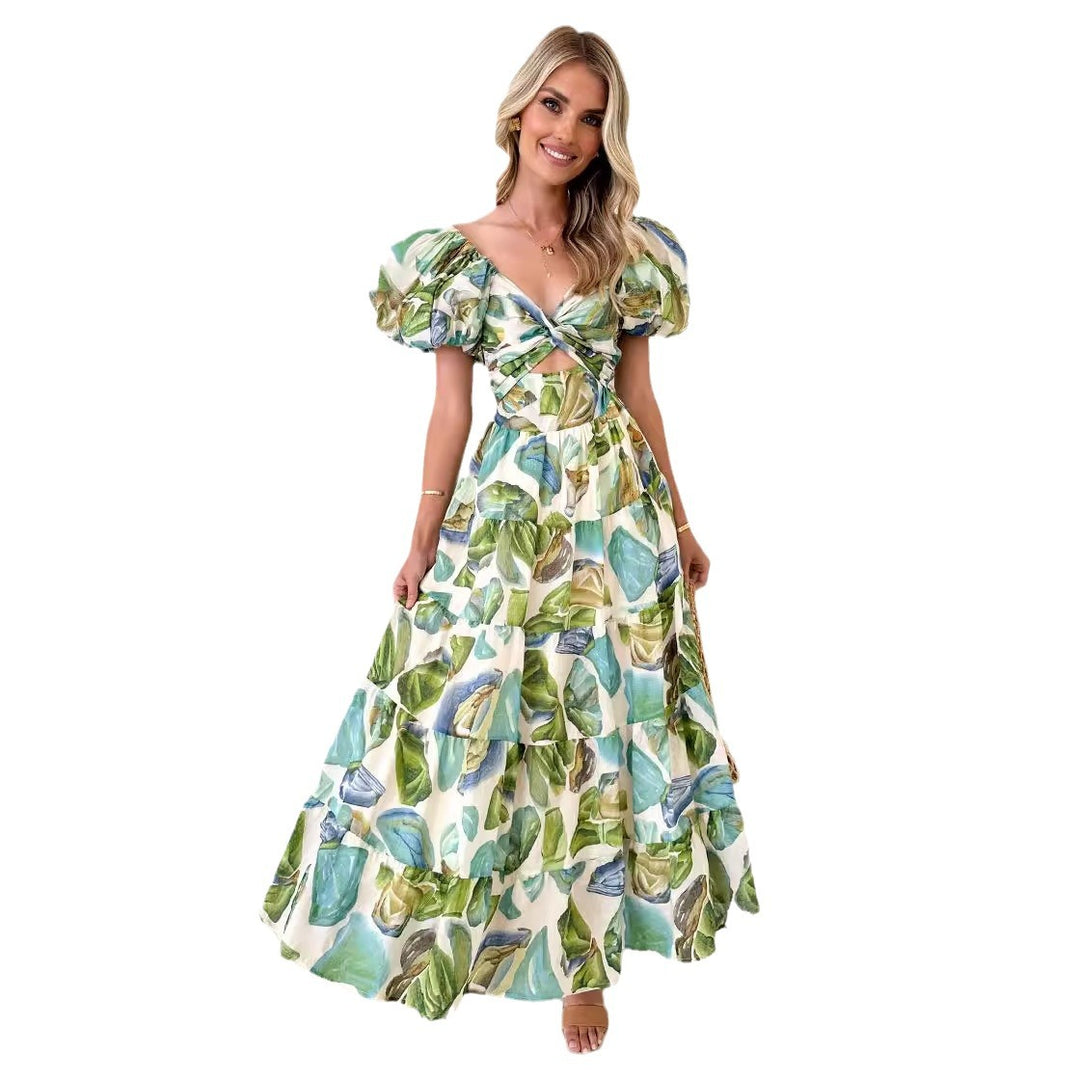 Kvinnors maxiklänning med voluminösa puffärmar och blommönster-Eva Jonsson