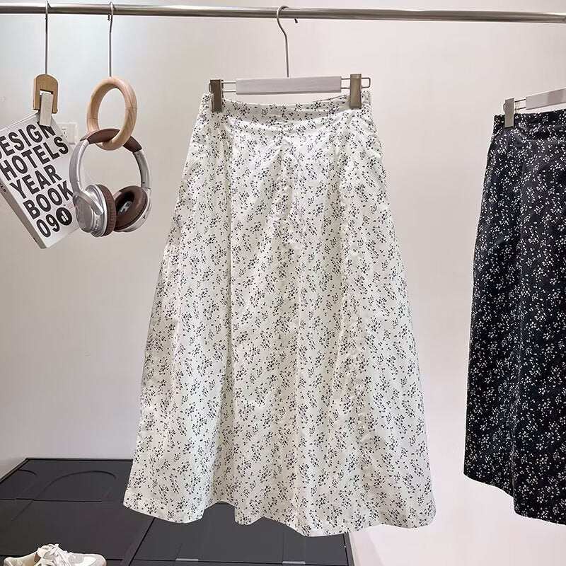 Kvinnors midikjol med blommönster och elastisk midja Mirla-Eva Jonsson