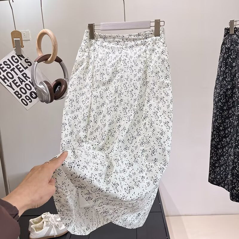 Kvinnors midikjol med blommönster och elastisk midja Mirla-Eva Jonsson