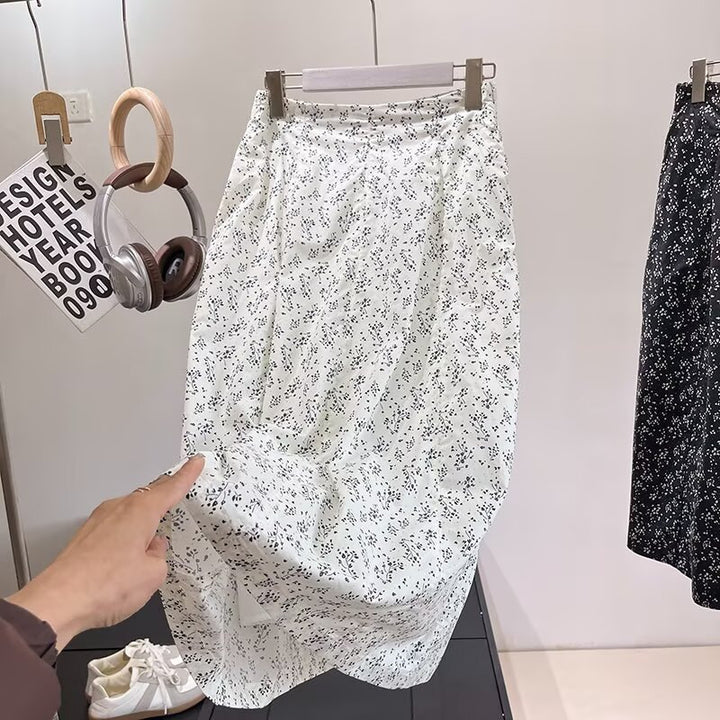 Kvinnors midikjol med blommönster och elastisk midja Mirla-Eva Jonsson