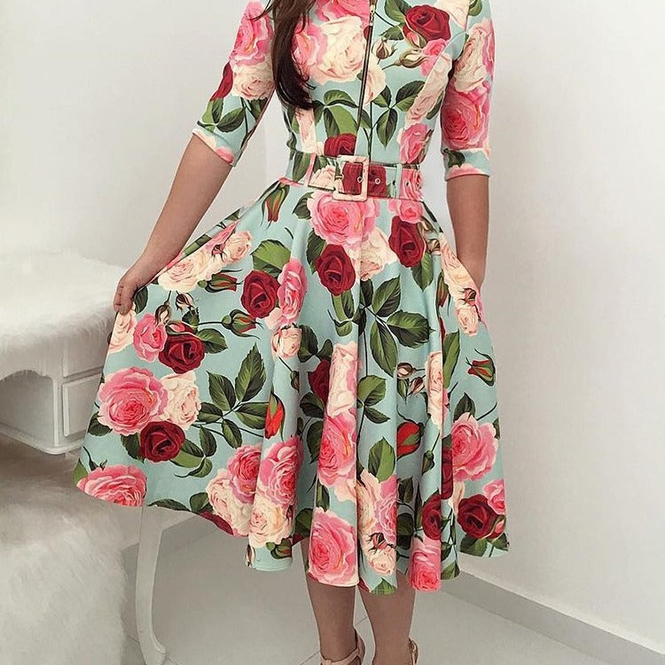 Kvinnors midikjol med blommönster och midjebälte Mirla-Eva Jonsson