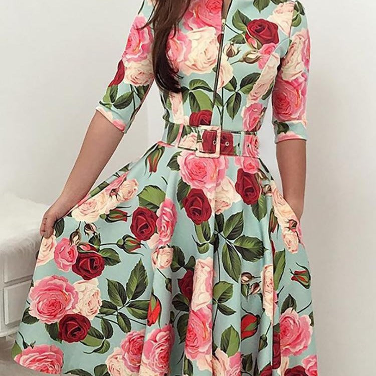 Kvinnors midikjol med blommönster och midjebälte Mirla-Eva Jonsson
