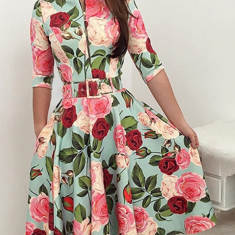 Kvinnors midikjol med blommönster och midjebälte Mirla-Eva Jonsson