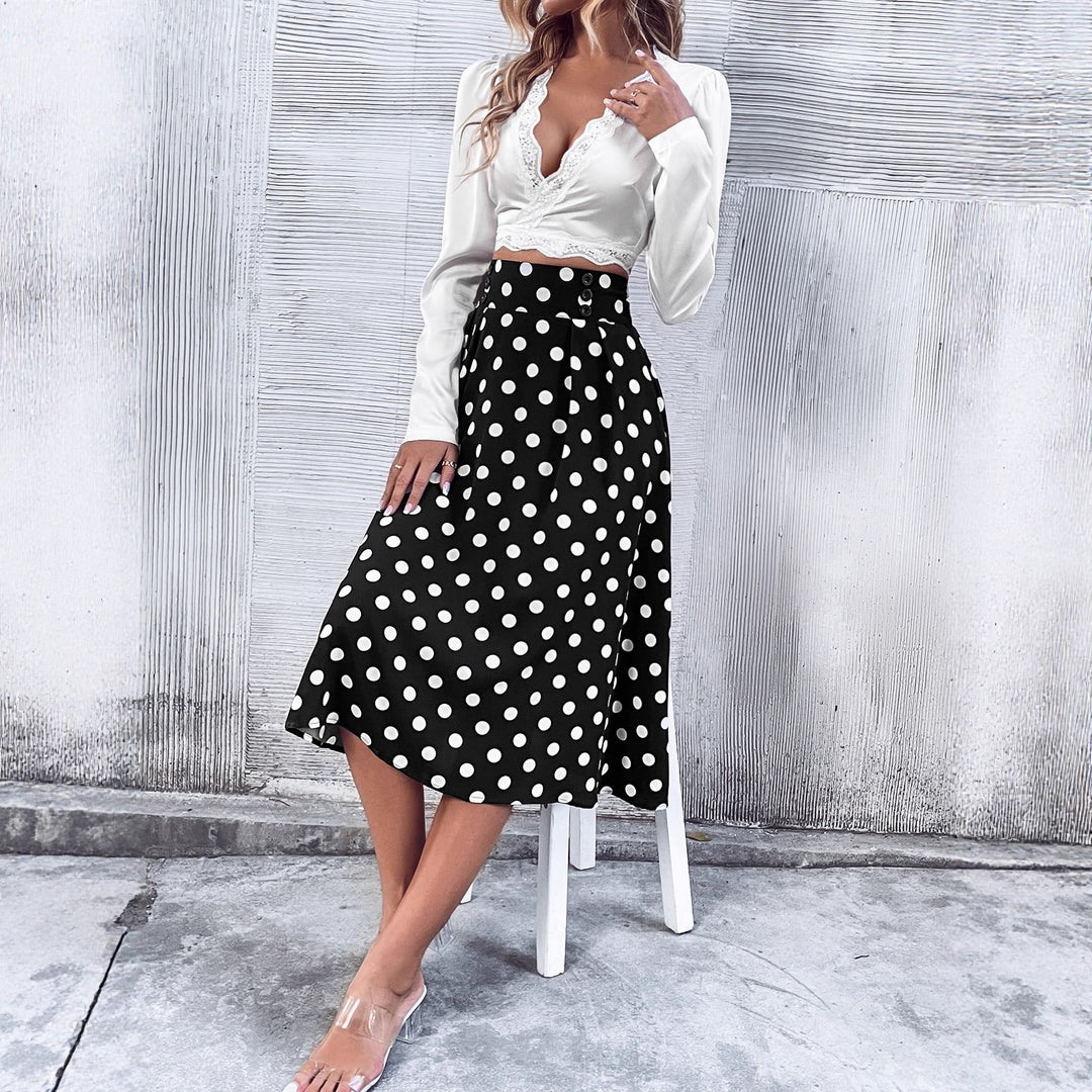 Kvinnors midikjol med elegant prickig design och hög midja Mirla-Eva Jonsson