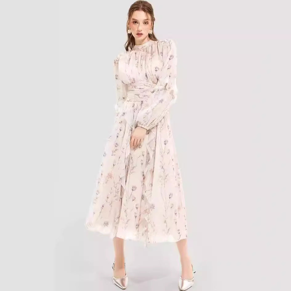 Kvinnors midikjolklänning med blommönster och elegant volangslut Mirla-Eva Jonsson