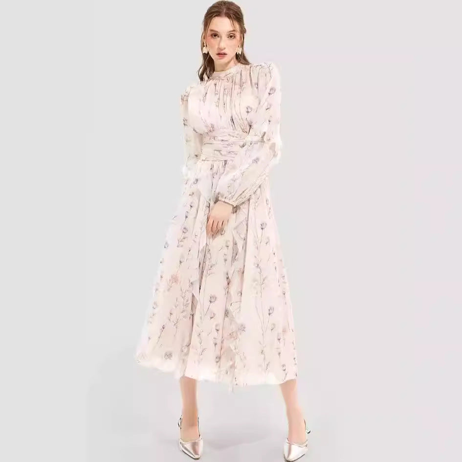 Kvinnors midikjolklänning med blommönster och elegant volangslut Mirla-Eva Jonsson