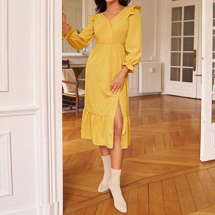 Kvinnors midiklänning med elegant volangdesign och sidoklyvning Mirla-Eva Jonsson