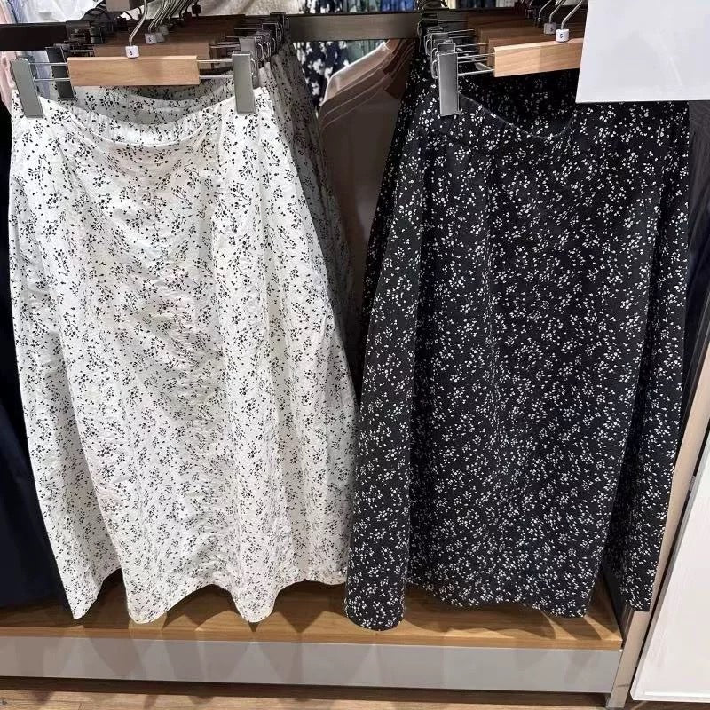 Kvinnors midkjol med elastisk midja och sidofickor Mirla-Eva Jonsson