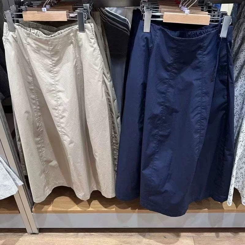 Kvinnors midkjol med elastisk midja och sidofickor Mirla-Eva Jonsson