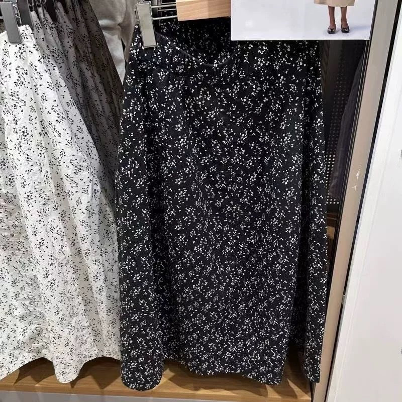 Kvinnors midkjol med elastisk midja och sidofickor Mirla-Eva Jonsson
