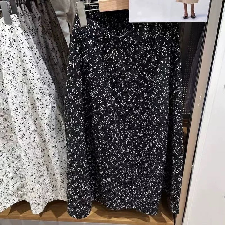 Kvinnors midkjol med elastisk midja och sidofickor Mirla-Eva Jonsson