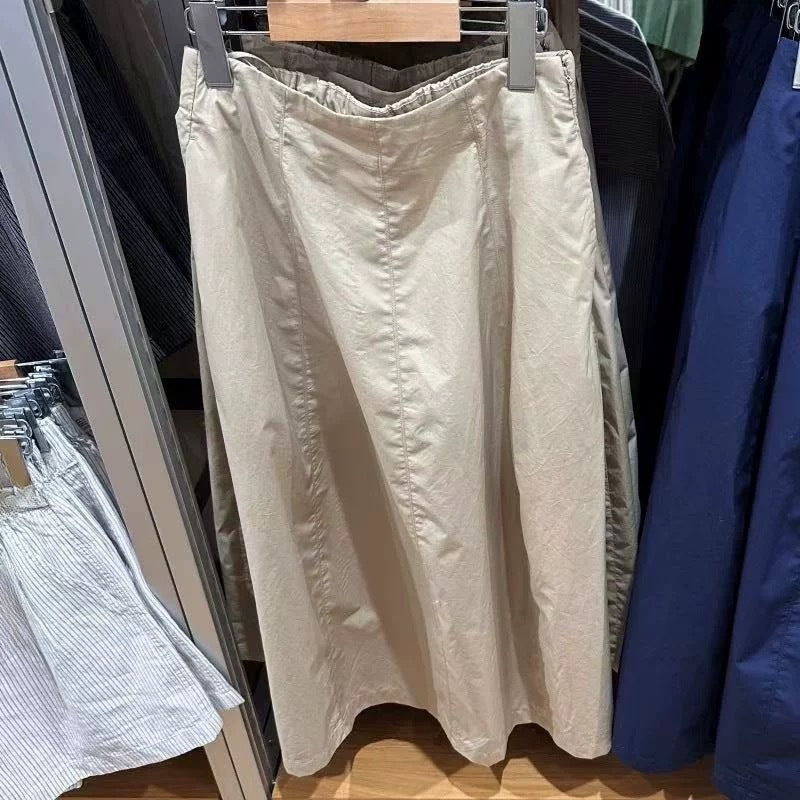 Kvinnors midkjol med elastisk midja och sidofickor Mirla-Eva Jonsson