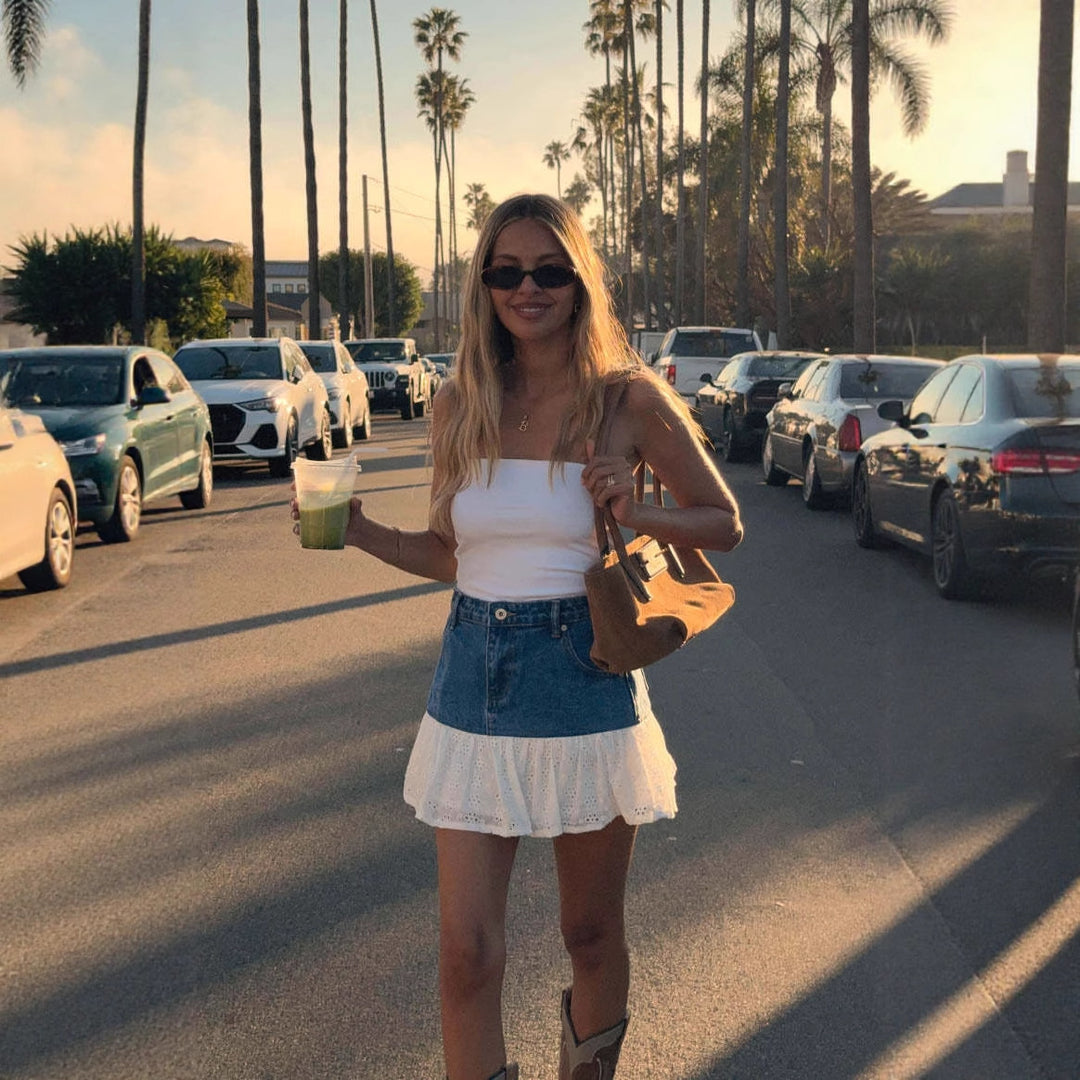 Kvinnors mini denimkjol med voluminös volangkant och skräddarsydd passform Mirla-Eva Jonsson