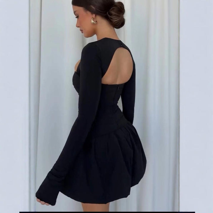 Kvinnors miniklänning med off-shoulder design och lång ärm Mirla-Eva Jonsson