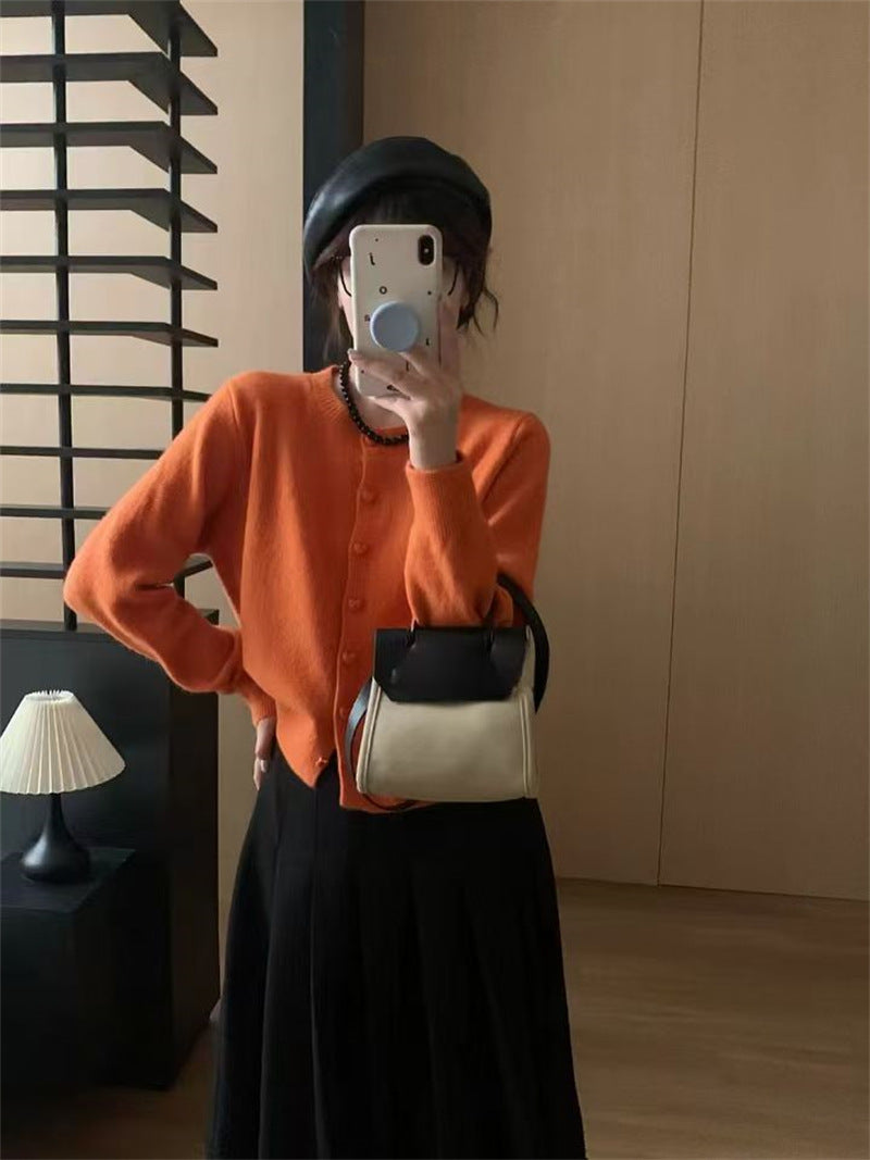 Kvinnors mjuka stickade cardigan med knappar och ribbad textur Mirla-Eva Jonsson