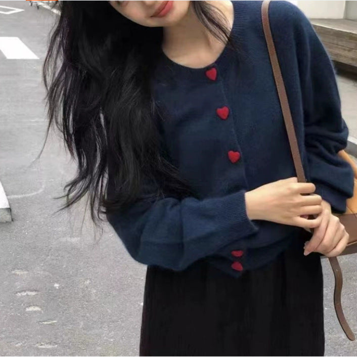 Kvinnors mjuka stickade cardigan med knappar och ribbad textur Mirla-Eva Jonsson