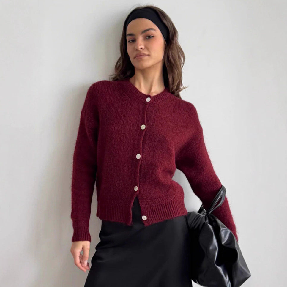 Kvinnors mjuka stickade cardigan med knäppning och voluminösa ärmar Mirla-Eva Jonsson